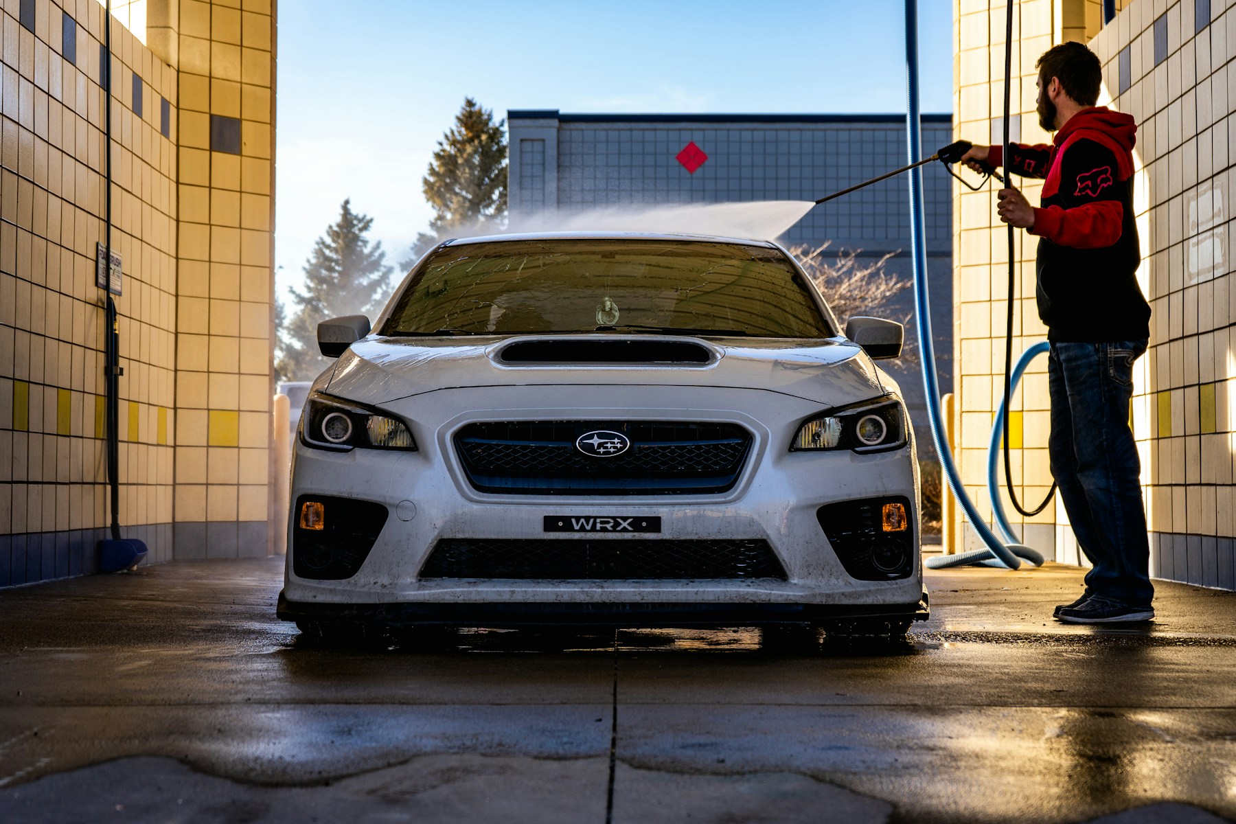 Representative image of a freshly detailed vehicle exterior and wheel